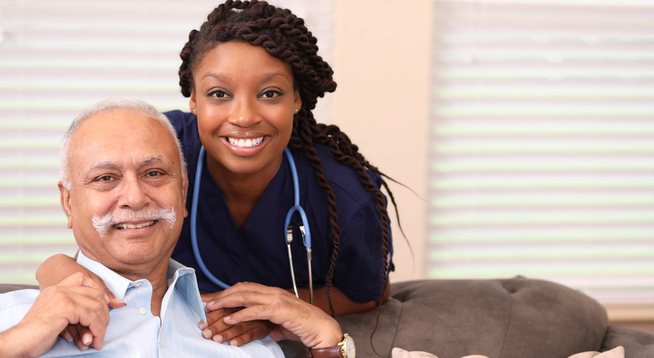 Nurse and man smiling Nurse and man smiling