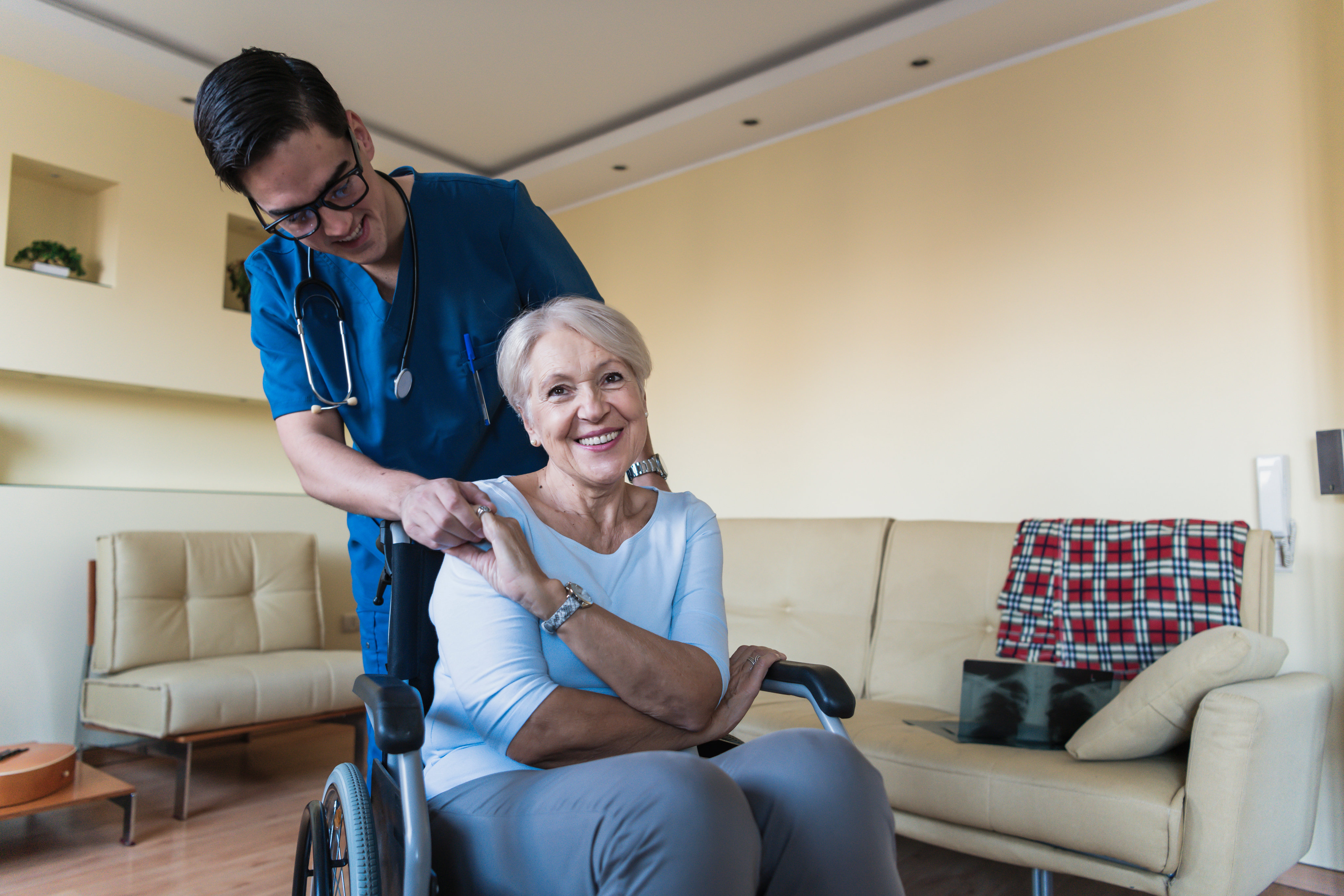 Nurse with patient in wheelchair